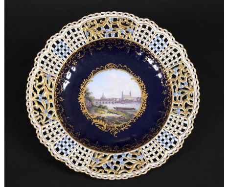 19THC MEISSEN PLATE - DRESDEN the centre painted with a landscape view of Dresden, with a gilded scroll border and dark blue 