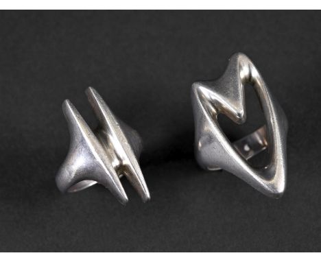 TWO GEORG JENSEN SILVER RINGS including Model No 89, of abstract form and designed by Henning Koppel. Also with another silve