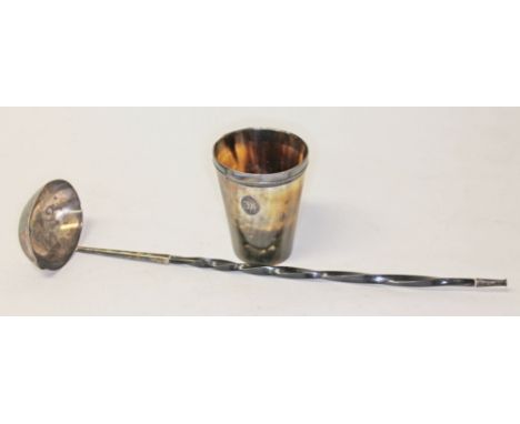 A hallmarked silver ladle with twist horn handle and a horn beaker with hallmarked silver rim.  