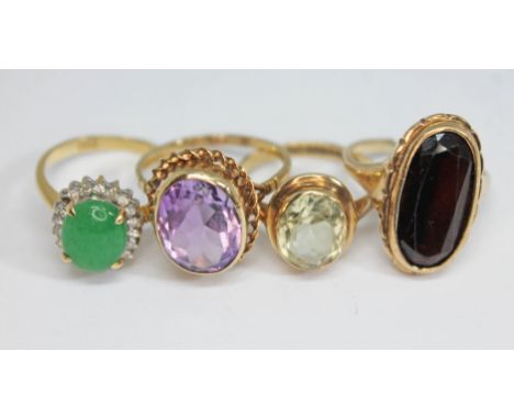 Four assorted rings comprising a diamond and crackled green dyed quartz cabochon ring marked '18K' &amp; '750' weight 3.55g, 