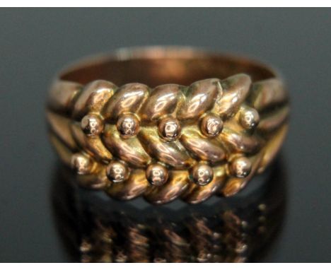 A 9ct gold ring of faux plaited design, weight 2.22g, size Q/R.  Condition - slight crack to reverse of band but not visible 