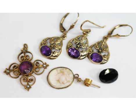 A mixed lot comprising a loose mixed cut oval sapphire weighing 3.95 carats (0.79g), a pink and white shell cameo earring, a 