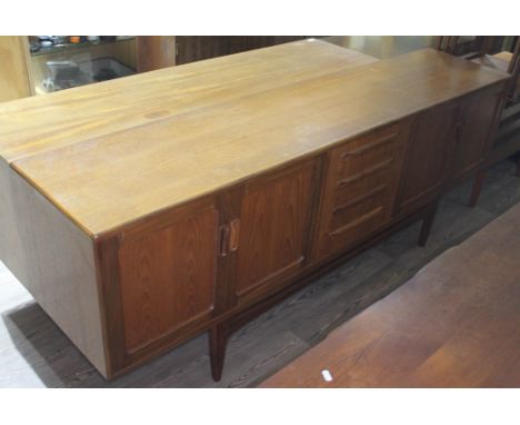 A G-Plan teak sideboard, length 214cm.Condition- Good, some general wear to include marks and light surface scratches to the 