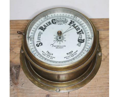 A ship's bulk head barometer signed S.D. Neill Belfast, diameter 23.5cm.  