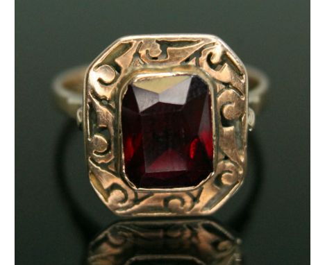 A synthetic ruby ring, band unmarked, gross weight 3.41g, size N/O.  