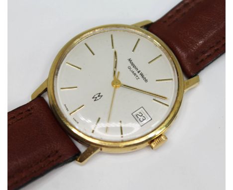 A Mappin &amp; Webb British Railways 9ct gold wristwatch, double signed champagne dial with gold tone hour batons, stick hand