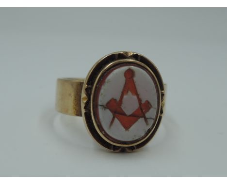 A 15ct rose gold signet ring with Freemason intaglio panel,size Q/R &amp;  approx 6.8g  (AF)