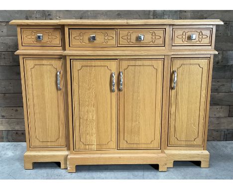 Light oak breakfront sideboard dresser, fitted with four drawers and four cupboardsDimensions: Height:&nbsp;92cm&nbsp; Length