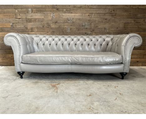 Three seat Chesterfield sofa, upholstered in grey buttoned leatherDimensions: Height:&nbsp;80cm&nbsp; Length/Width:&nbsp;225c