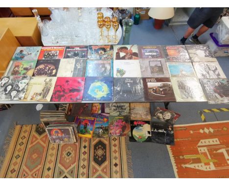 A collection of 1970/80s vinyl records to include Janis Joplin, Buffalo Springfield, The Mothers of Invention, Led Zeppelin, 