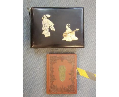 A Japanese ivory inlaid lacquered photo album, together with an Art Nouveau photo album Location: 1.5 