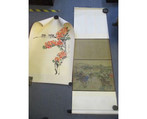 A Japanese picture scroll with calligraphy above, the picture finely detailed with figures around a central building with can