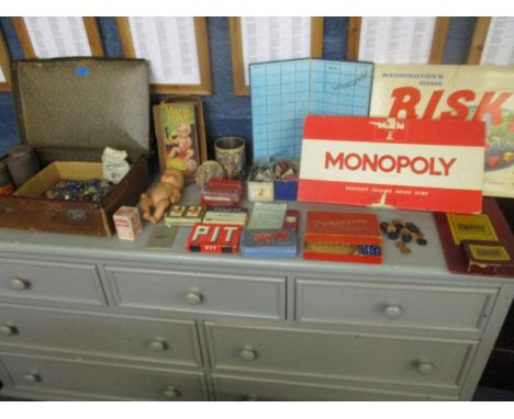 A leather suitcase containing a Victorian marble, various 1930s and later glass marbles, a Dinky and Corgi Toys Routemaster L