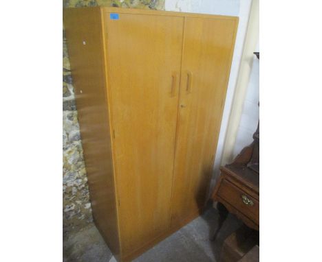 A mid century light oak G-Plan E Gomme two door wardrobe 175cm h x 92cm w 