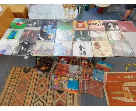 A collection of 1970/80s vinyl records to include Jimi Hendrix, War, Crosby, Stills &amp; Nash, Led Zeppelin, Frank Zappa, Ea