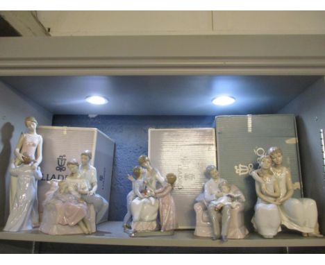 A group of five Lladro porcelain figurines, three with boxes, to include a Circle of Love and Grandfather's Stories 