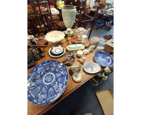 A collection of 19th century porcelain and later to include a teapot, a green Crown Derby vase, an oil lamp base, a Minton ob