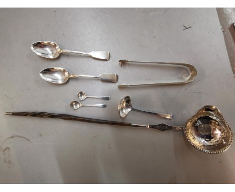 Silver to include a pair of Georgian sugar tongs, two teaspoons, caddy spoon, and two condiment spoons 121g, together with a 