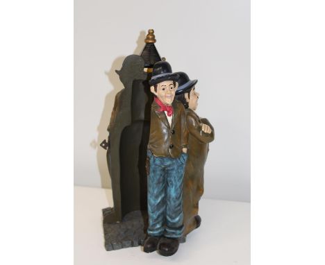 A vintage Laurel &amp; Hardy ceramic wine bottle holder (sold as seen) h43cm 