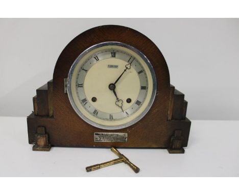 A vintage wooden cased mantle clock (untested) 