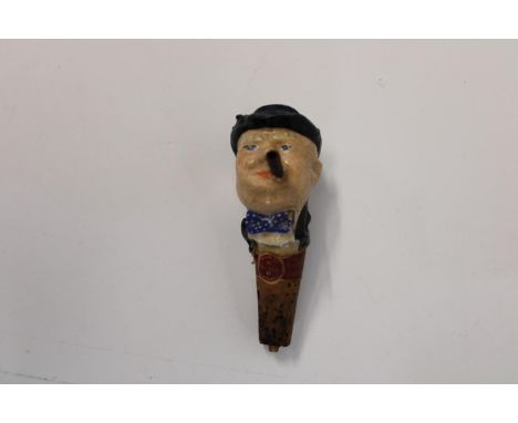 A vintage novelty Winston Churchill bottle stopper 