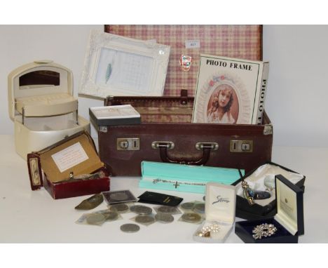 A vintage suitcase &amp; contents 