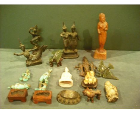 A mixed lot of Asian/Oriental decorative items, including Indian and Cambodian bronzes, a small ivory Buddha, carved jade bir