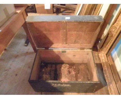 A 19th century black painted wood cabin trunk.