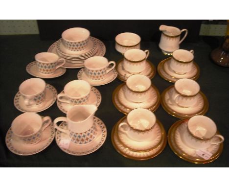 A Paragon Athena tea service, a six place setting, comprising cups, saucers, tea plates, cream and sugar, together with a Roy