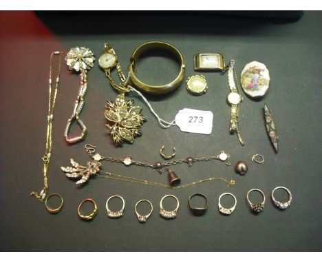A mixed lot of jewellery, including gold cased and other wristwatches, a gold plated bangle, gold and other rings, costume an