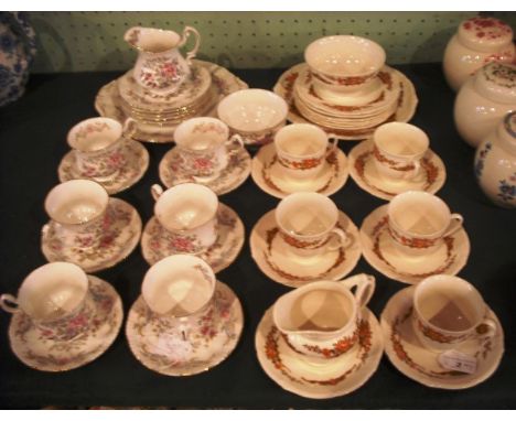 A Royal Standard Mandarin pattern tea service, a six plate setting, comprising cups, saucers, cream, sugar, six tea plates an