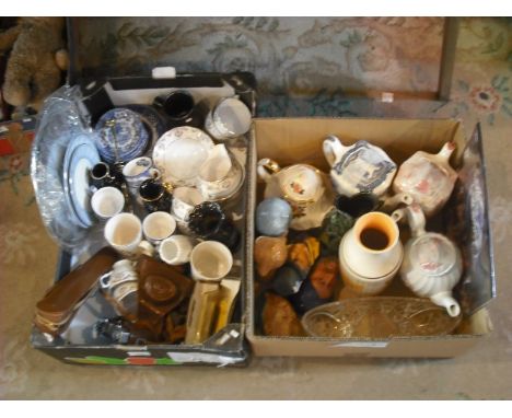 Two boxes of decorative ceramics and other items, including transfer decorated teapots, Bossons wall masks, a Pax camera with