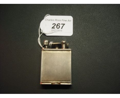 A silver Parker Beacon cigarette lighter with engine turned case, hallmarks for London 1933.