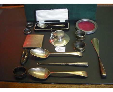 A mixed lot of small silver, including serviette rings, circular photograph frame, shoe horn, nail buffer, cigarette case and