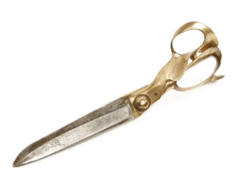 A pair of brass handled tailors shears by WILKINSON Sheffield G+ 