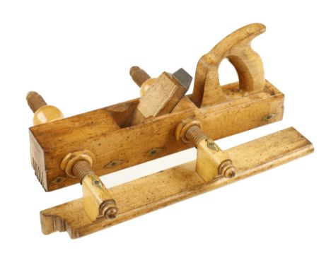 A most unusual handled beech grooving plane by MALLOCH Perth with boxwood screwstems and nuts to produce 6 grooves with one s