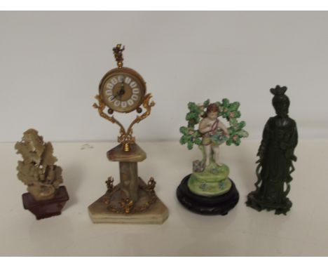 Onyx clock together with two ceramic figures 