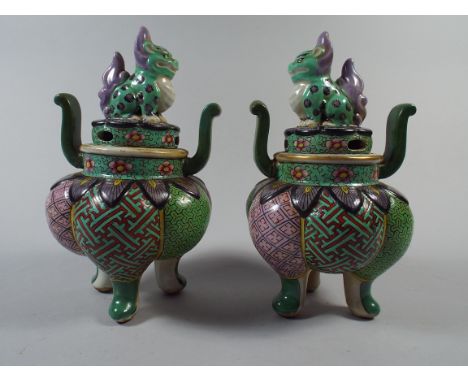 A Pair of Oriental Ceramic Koro with Temple Dog Pieced Lids Decorated in Green, Pink and Red Enamels. Seal Mark to Base. 19cm