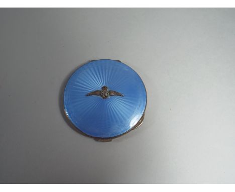 A Ladies Silver Compact with Enamelled Lid and RAF Insignia Mount. Engine Turned Decoration under. Birmingham 1947. 7.5cm Dia