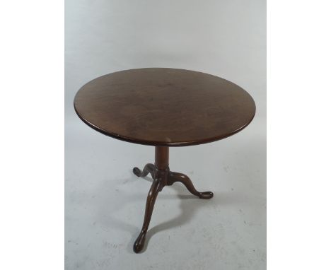 A Georgian Mahogany Bird Cage Tripod Table having Gun Barrel Support and One Piece Top 