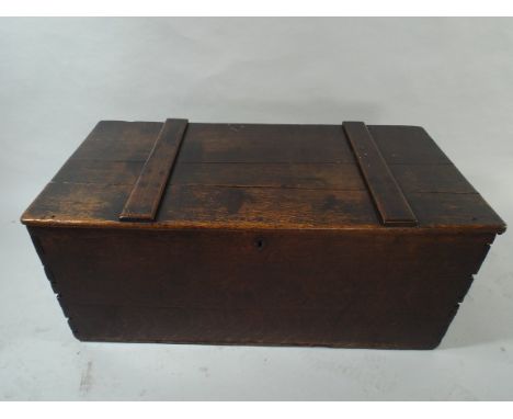 An Early 19th Century Oak Travelling Trunk with Iron Carrying Handles