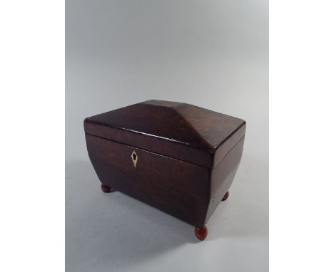 A 19th Century Burr Yew Wood Tea Caddy. The Interior with Two Lidded Compartments. 20x12x15cm