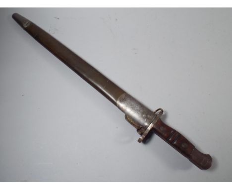 An American Bayonet by Remington, Stamped 1913 9 17 together with  Scabbard.