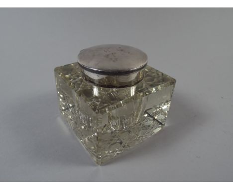 A Square Topped Glass Inkwell with Hinged Silver Lid. Birmingham 1946. 7cm High