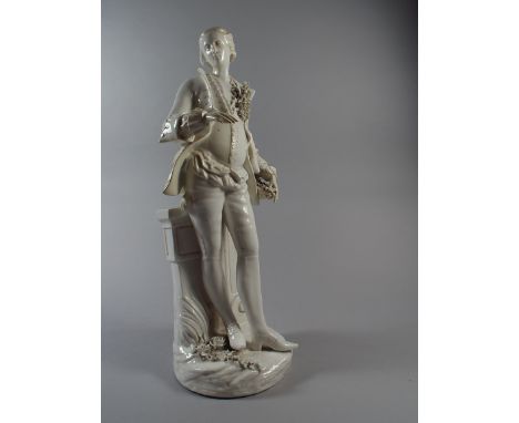A Continental White Ceramic Figure of a Victorian Dandy with Posies. Blue Under Glazed Mark to Base. Restoration to Hands and