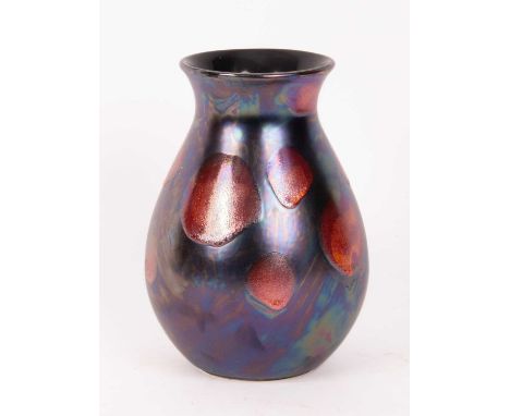 A Poole pottery Galaxy vase 25.5cm high and sixteen side plates by Lulu Guinness for Nieman Marcus, boxed