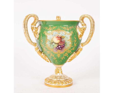 A Royal Worcester three-handled vase, the green ground with painted fruit cartouche, signed Hawkins, and with raised gilt flo