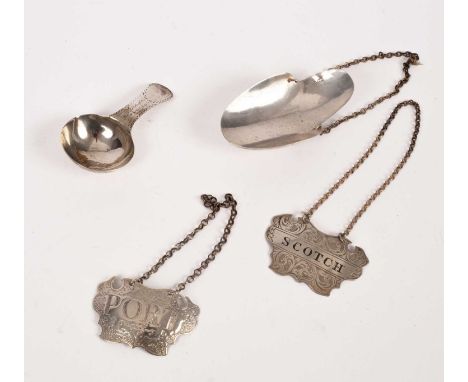 A George III silver caddy spoon, Stephen Adams, London 1787, two silver decanter labels for Port and Scotch and a decanter dr