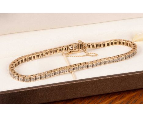 A 9ct gold and diamond tennis bracelet, approximately 10g