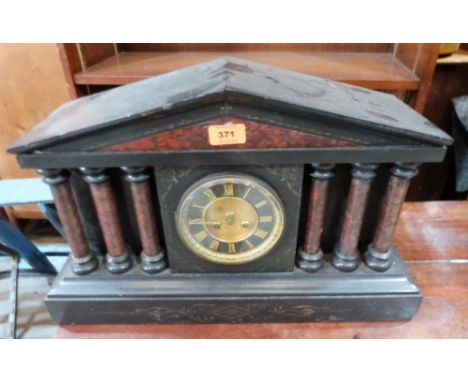A French black slate and marble mantle clock in architectural case. c.1890. 20' wide